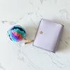 ONE-OF-A-KIND POM POM ACCESSORY